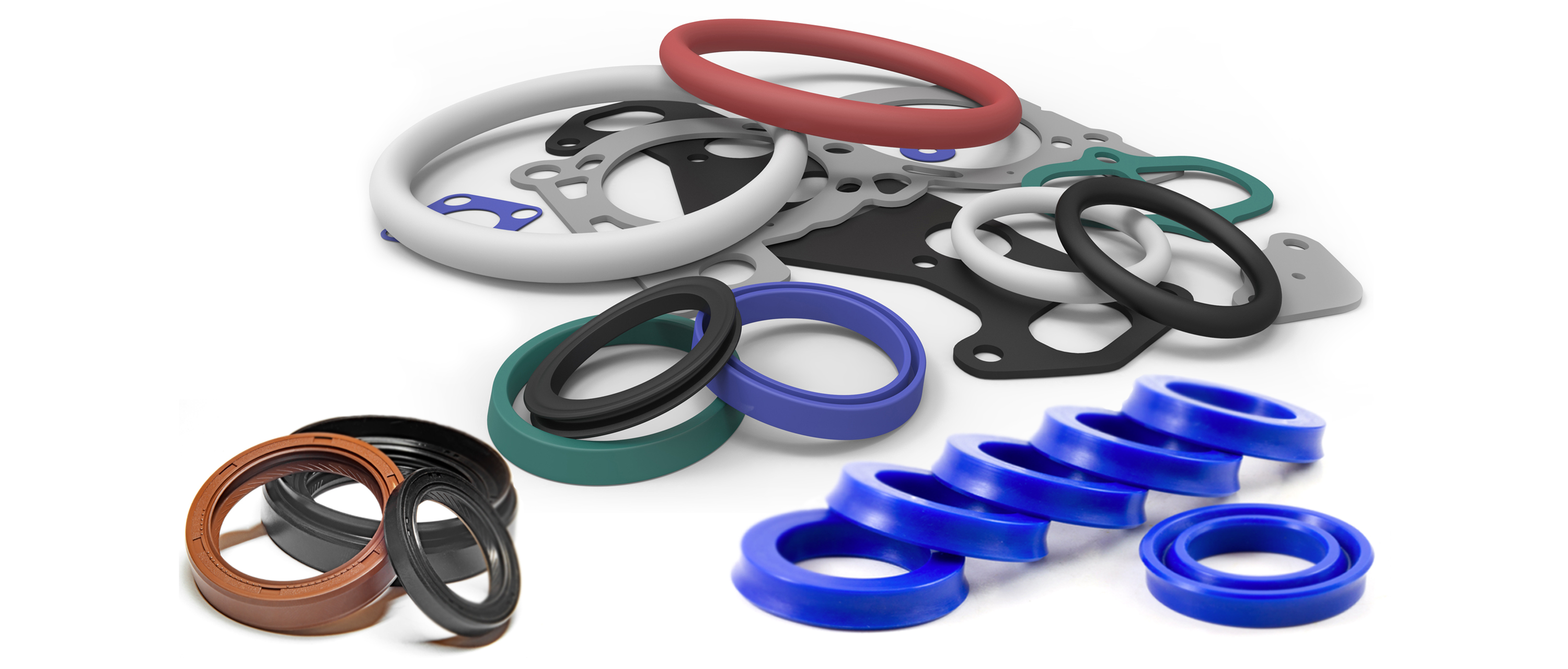 Various hydraulic seals in assorted colors and sizes.